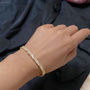 Baguette gold cuff bracelet